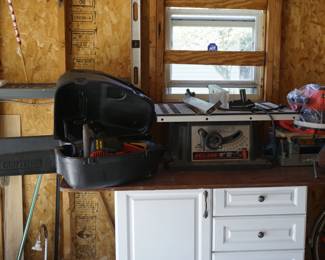 Two Craftsman chainsaws