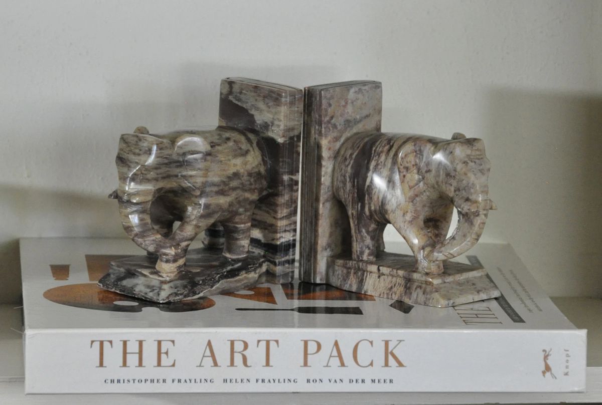 Attractive marble bookends along with "The Art Pack" book, a very interesting and useful book.