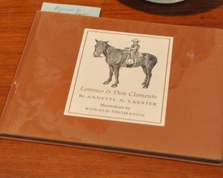 This book is signed by the illustrator, Ronald Thomason. We have a signed and numbered lithograph by him.