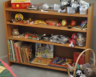 Many vintage toys and children's books - Fisher Price record player has it's records.