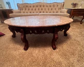 Marble coffee table with restored vintage Victorian couch.