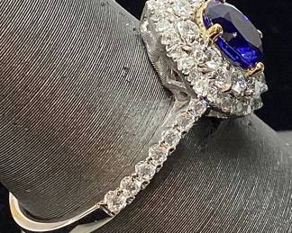 18KT WHITE & YELLOW GOLD BLUE SAPPHIRE & DIAMOND RING SIZE 7.25, 1.08cts SAPPHIRE, 0.56cts DIAMONDS, 3.7g TOTAL

WEIGHT GGA APPRAISAL $11,970.00,