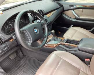 2005 BMW X5 SUV, WHITE WITH TAN LEATHER INTERIOR, 300,175 MILES, GOOD RUNNING CONDITION, TIRES ARE IN GOOD CONDITION POWER WINDOWS & A/C ARE WORKING
DRIVER SEAT HAS A TEAR IN THE LEATHER,