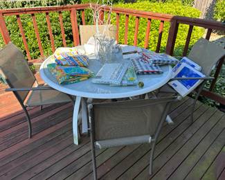 White Patio Table with White Glass Top, 4 Tan Patio Chairs