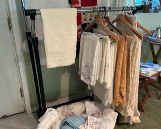 Assortment of Tablecloths and Tea Towels