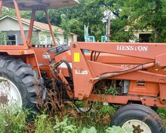 65 horse power 60-56 Hesston tractor with  brush hog twin forks on front lift runs great cab cover pluss comes with front loader bucket this bad boy does it all 3point hitch accommodates  most implementes