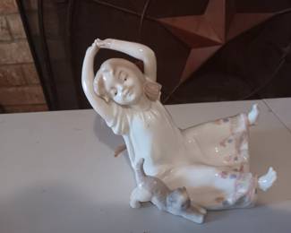 Stretching girl in nightgown with kitten 