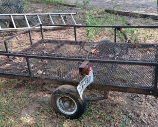 2 wheel utility trailer with rear gate and loading ramp