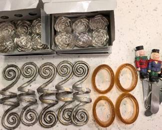 24 silver plated rosette name place holders (new),                         6 metal napkin holders, 4 glass napkin holders with matching napkins, 4 Christmas Cheese Spreaders