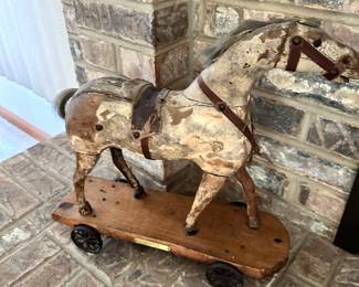 Around 150 years old.  Rare find. Old pull toy