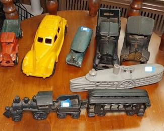cast iron trucks, train, steamboat