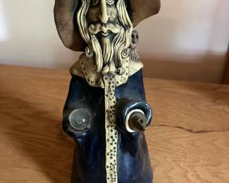 Pottery sorcerer candle 