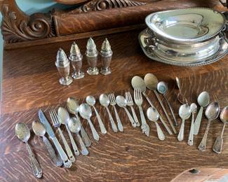 Silver spoons, salt and pepper shakers