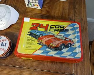 Case with Matchbox cars