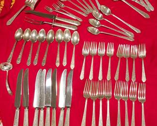 Sterling silver flatware, Treasure 54 pieces, 8 knives, 8 dinner forks, 8 teaspoons, 8 salad forks, 4 soup spoons, 4 ice tea spoons, 4 pickle forks3 butter knives, 2 ladels, 2serving spoons and a 3 piece carving set and meat fork