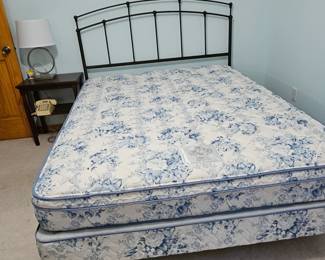 Queen size bed with metal headboard