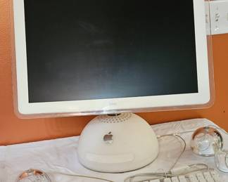 iMac computer with keyboard and speakers