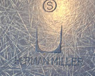 Mark on Herman Miller chair.