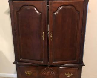 Cherry armoire TV stand with drawer