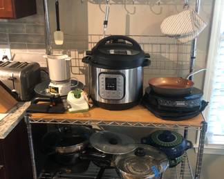 Pots and pans and bakers rack