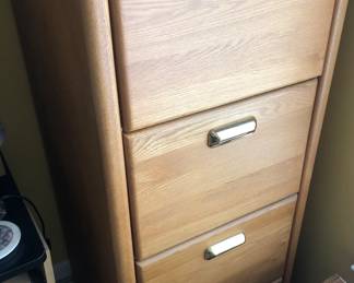 Oak four drawer file cabinet