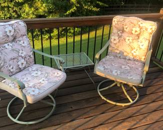 2 outdoor swivel rocking chairs with cushions