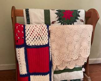 Quilt rack, afghans, and quilts