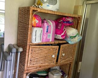 Over-the-toilet wicker cabinet