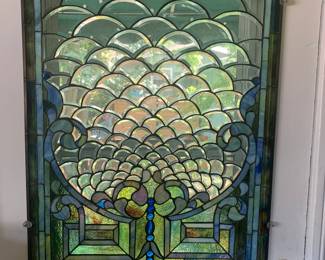 This stained/leaded glass piece is best described as….hmmm….ridiculous! I’m betting it’s not like anything you have ever seen before and may never see again…impressive to say the least!