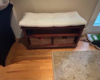 Upholstered shoe bench with baskets underneath