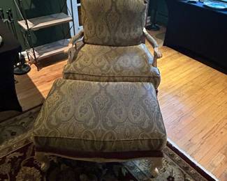 It from now on upholstered chair with the leather and ottoman