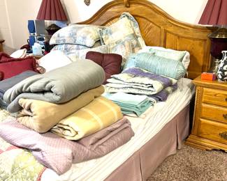 king oak bed, linens, blankets