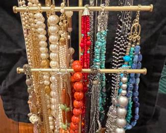 A variety of semi precious stones and costume, jewelry necklaces