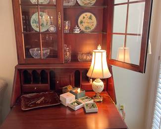 Secretary desk with Lenox lamp, Swarovski crystal ornaments, Potterybarn plates and William Yeoward crystal, and more