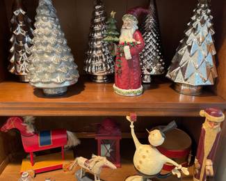 Holiday trees (lit) and wooden Santas and more