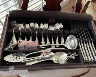 silver-plated cutlery in storage case -