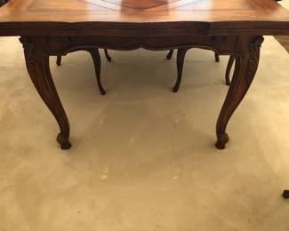 KARGES DINING ROOM TABLE WITH END PULL OUT LEAVES 76 BY 43 WITH LEAVES EXTENDS TO 85 WALNUT FINISH WITH 6 CHAIRS