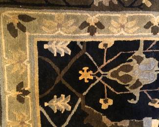 TAUPE AND BLACK AREA RUG