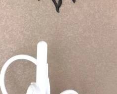 Vintage PVC Towel Holder, Cast Metal Sun Face