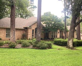 This lovely home, listed by Pamela Walters, is located at 1503 Woodlands Drive in Hollytree, Tyler, Texas.