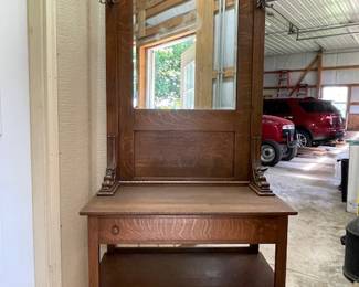Antique tall quartersawn oak hall tree with lion’s head and claw feet