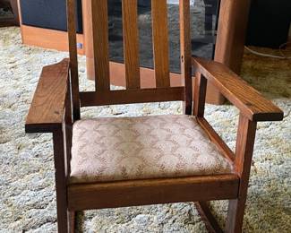 Antique oak Craftsman-style child’s rocker