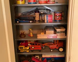 Vintage collectible metal toys, including a 1957 Michigan crane