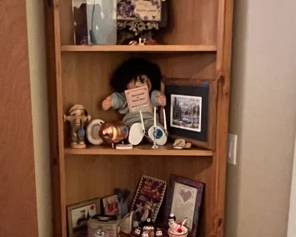 Corner hutch, dolls and decorations