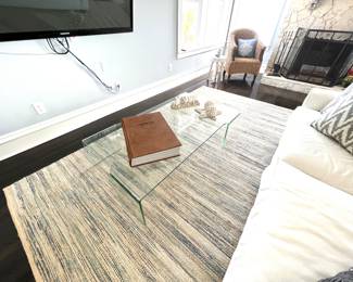Glass Coffee Table 30”x53”
Rug 7’x10’ 