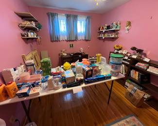 tupper ware, band aids, books, coffee, headboards, desk and chair