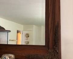 Plate glass mirror with carvings