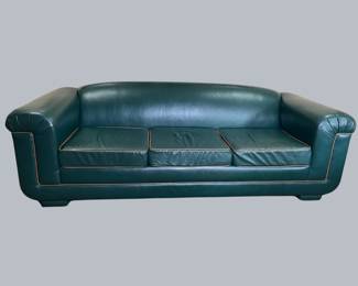 Streamlined Green Faux Leather Sofa With Beige Contrast Piping
