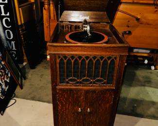 PRICE: $300 FIRM
ANTIQUE BRUNSWICK PHONOGRAPH RECORD PLAYER (WORKS)
19”W x 21”D x 46”H