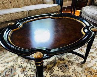 PRICE: $600
MAITLAND-SMITH SUAVE COCKTAIL TABLE WITH BRASS CASTER WHEELS
40”L x 32”W x 20”H